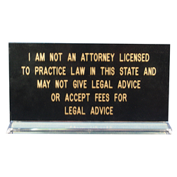 Kansas notaries, protect yourself! Inform your clients that you are not an attorney and cannot give legal advice or accept fees for legal services. This eye-catching sign is printed in gold letters on a black background with a clear acrylic base. Available in English and Spanish. This is an essential item that should be added to your Kansas notary supplies order.